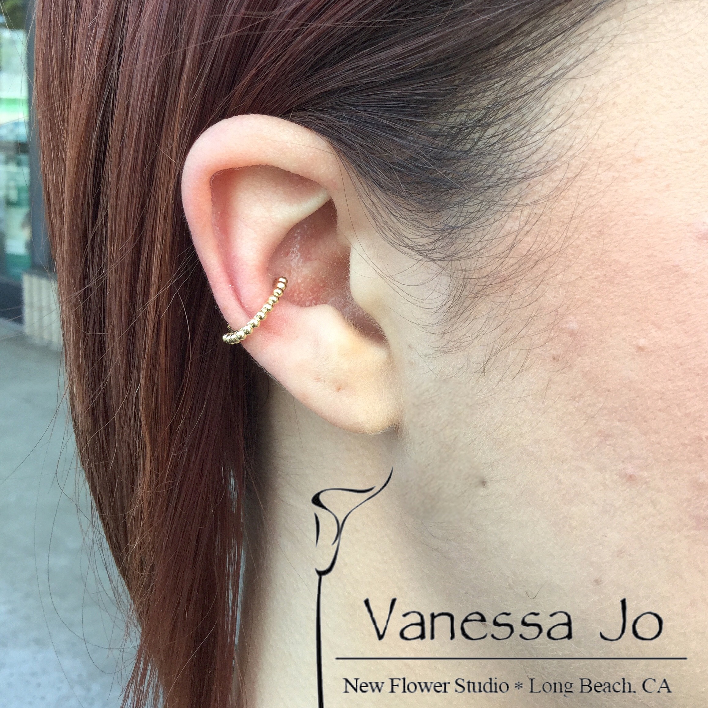 Healed conch with yellow gold Vaughn ring