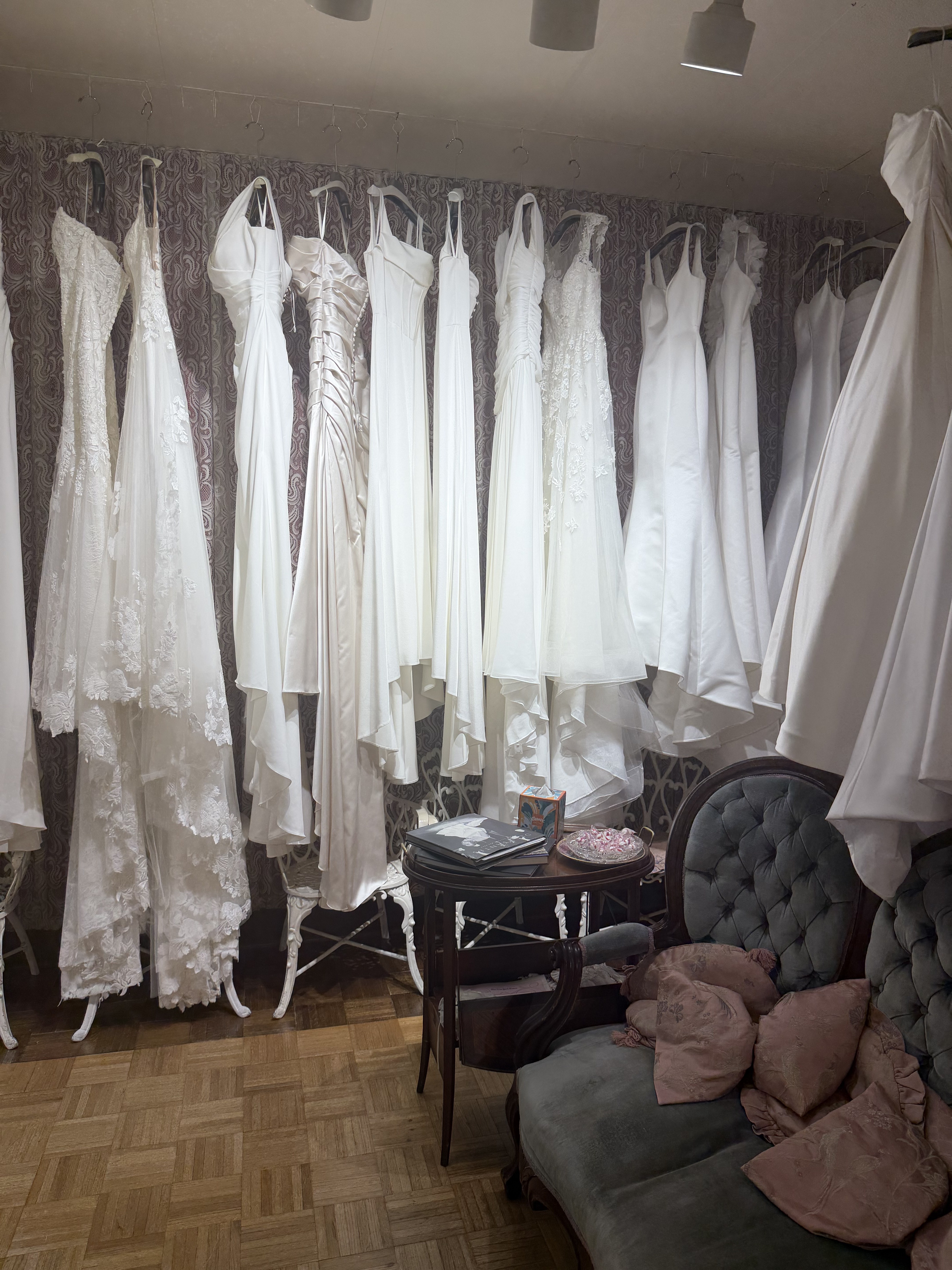 wedding dresses hung from the ceiling