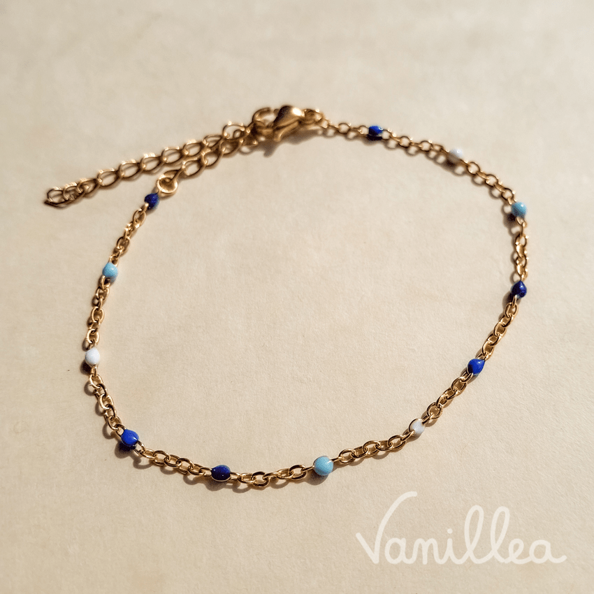 bracelet perles bleues acier inoxydable doré détail chaîne fine