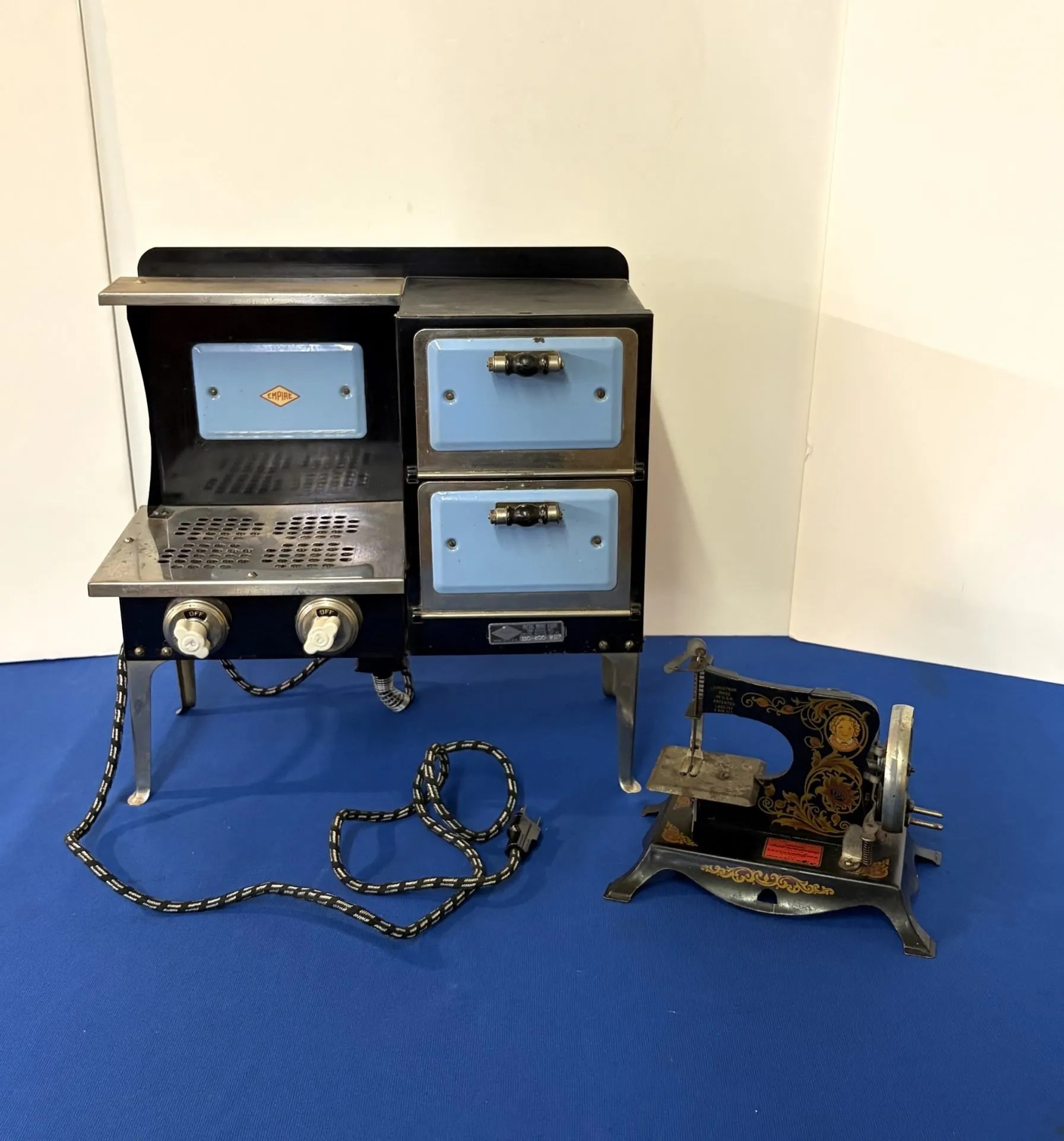 Lot 77:  Two Excellent Early 1900’s Child’s Metal Electric Toys.