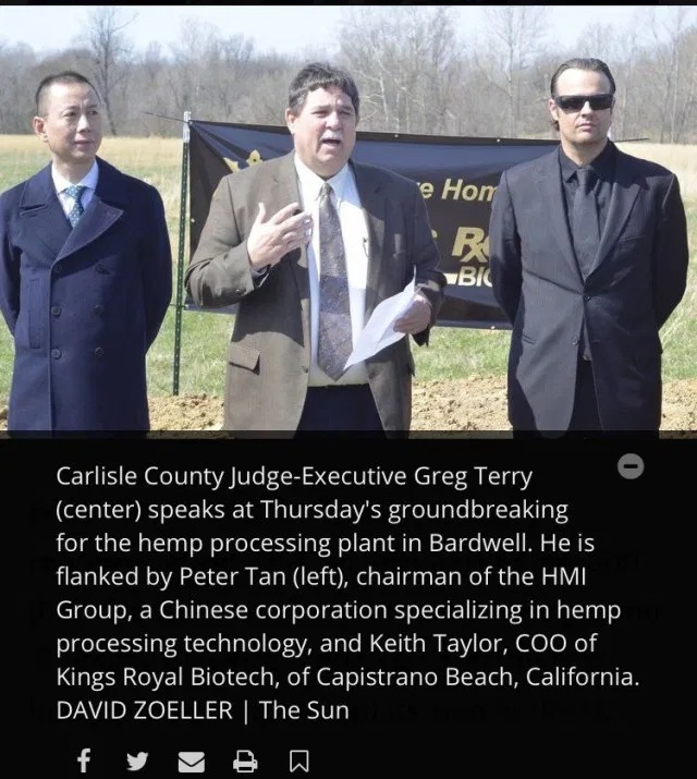 Carlisle County Judge-Executive Greg Terry (center) speaks at Thursday's groundbreaking for the hemp processing plant in Bardwell. He is flanked by Peter Tan (left), chairman of the HMI Group, a Chinese corporation specializing in hemp processing technology, and Keith Taylor, COO of Kings Royal Biotech, of Capistrano Beach, California. DAVID ZOELLER I The Sun