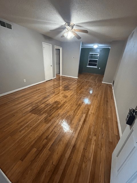 Living room hardwood floor refinishing in Lawton Oklahoma by VCV Services