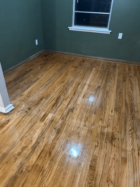 Bedroom hardwood floor refinishing in Lawton Oklahoma by VCV Services