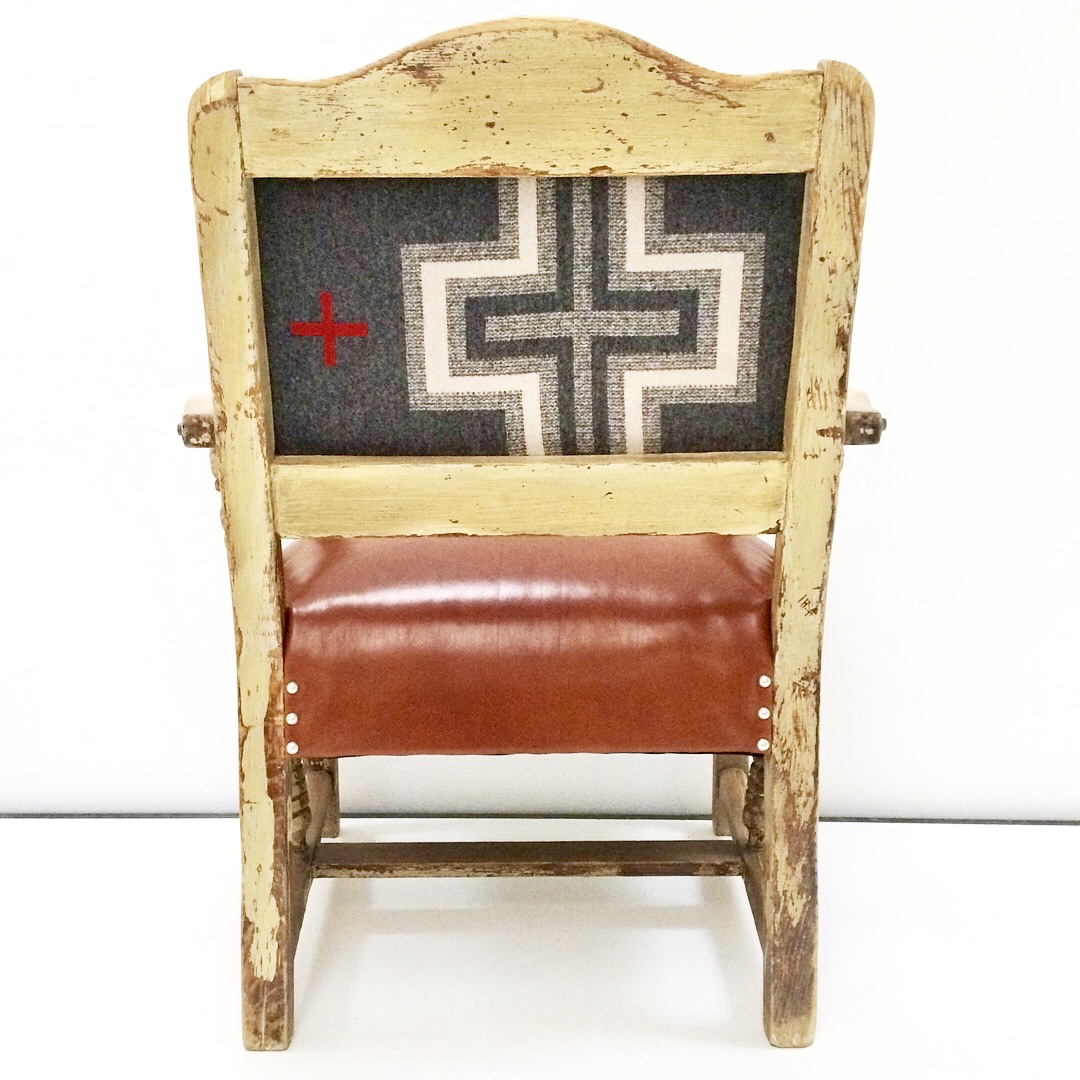 Pendleton wool and rich leather suit this western chair very well.