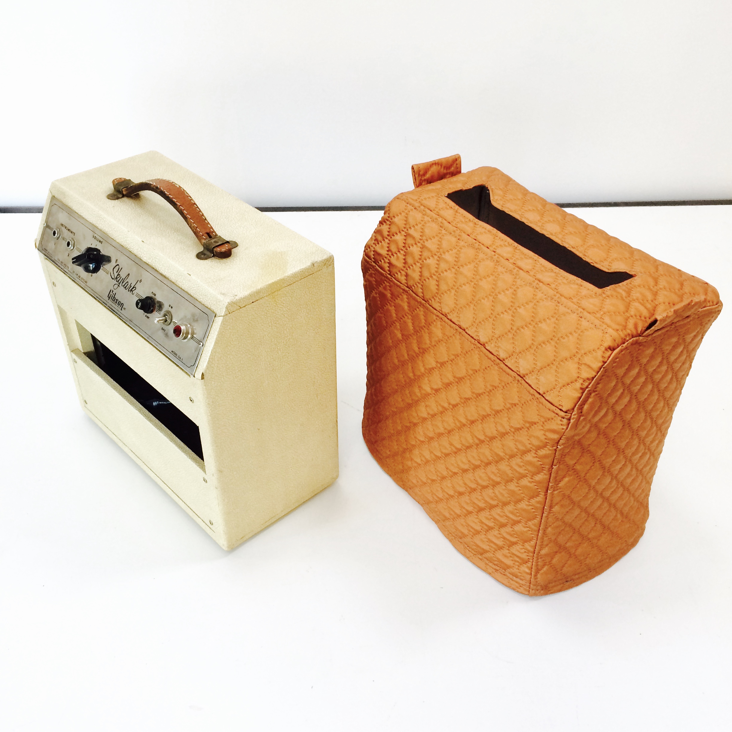 This vintage amp is now protected with a rigid, quilted cover.