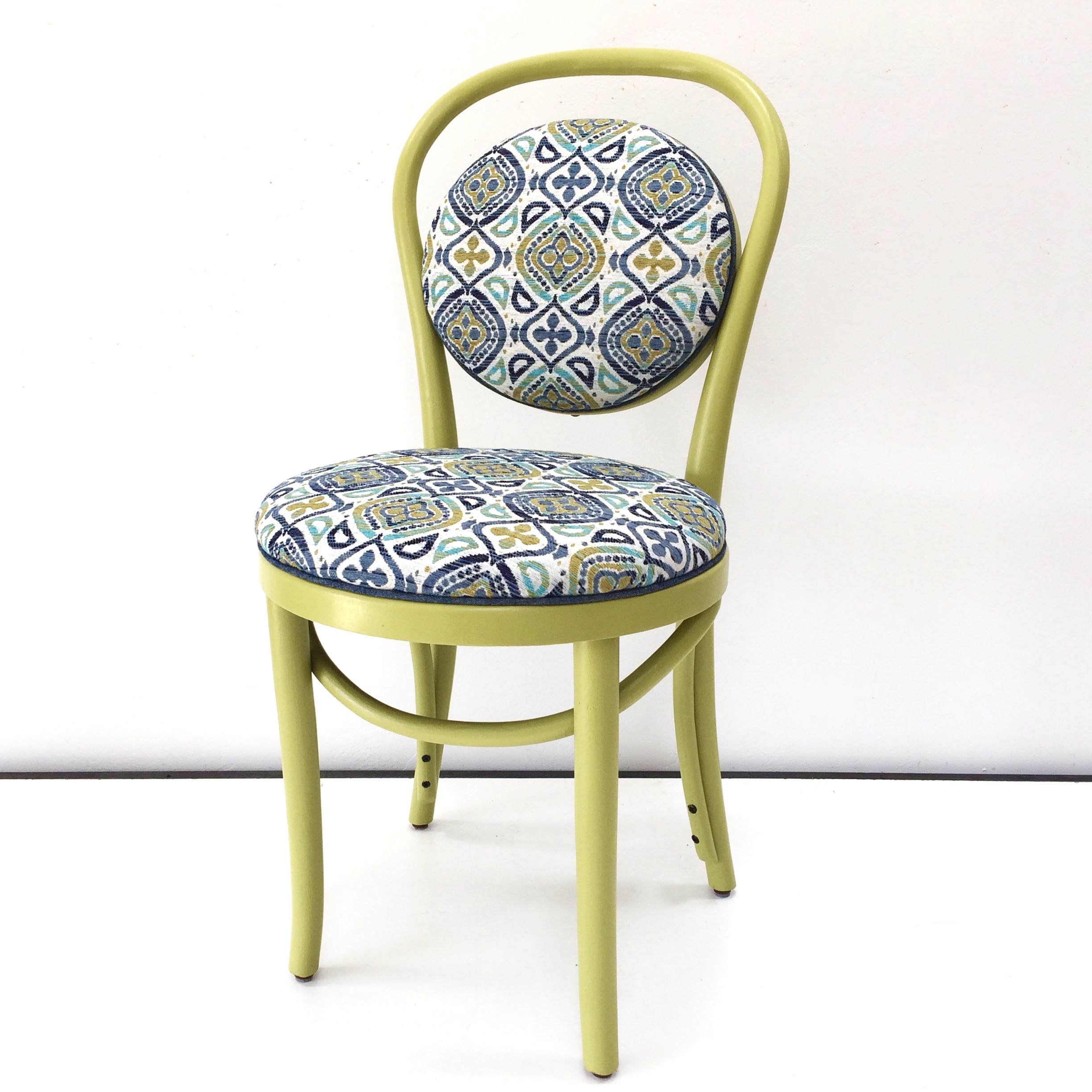Vibrant paint transforms an old, dull chair.