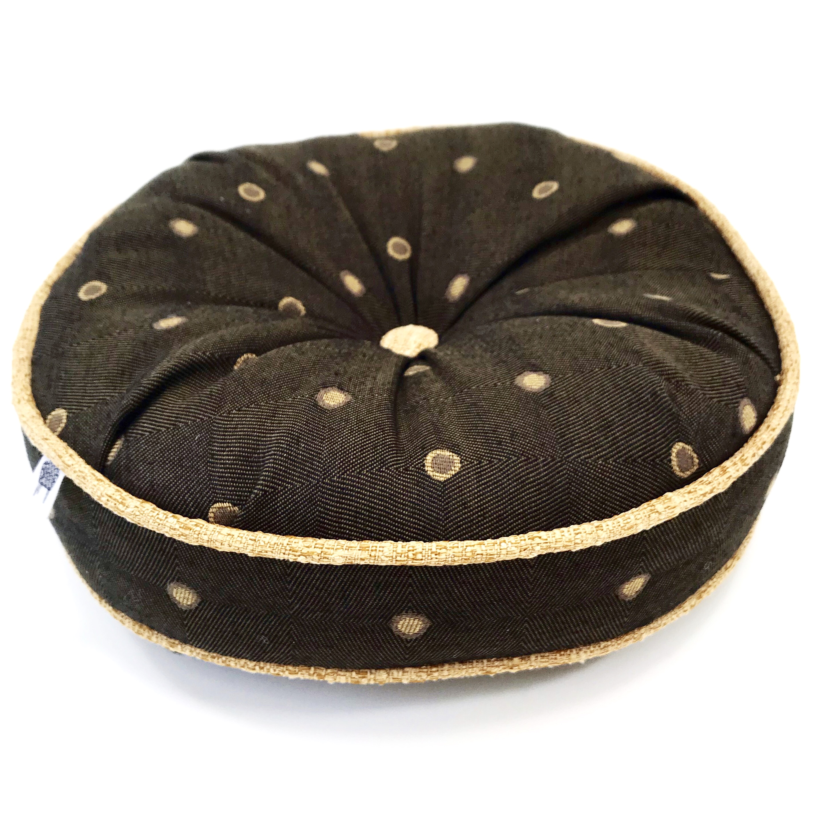 An accent pillow in matching fabric can help tie a new piece of upholstered furniture into a room--in this case, the new cedar chest cushion.