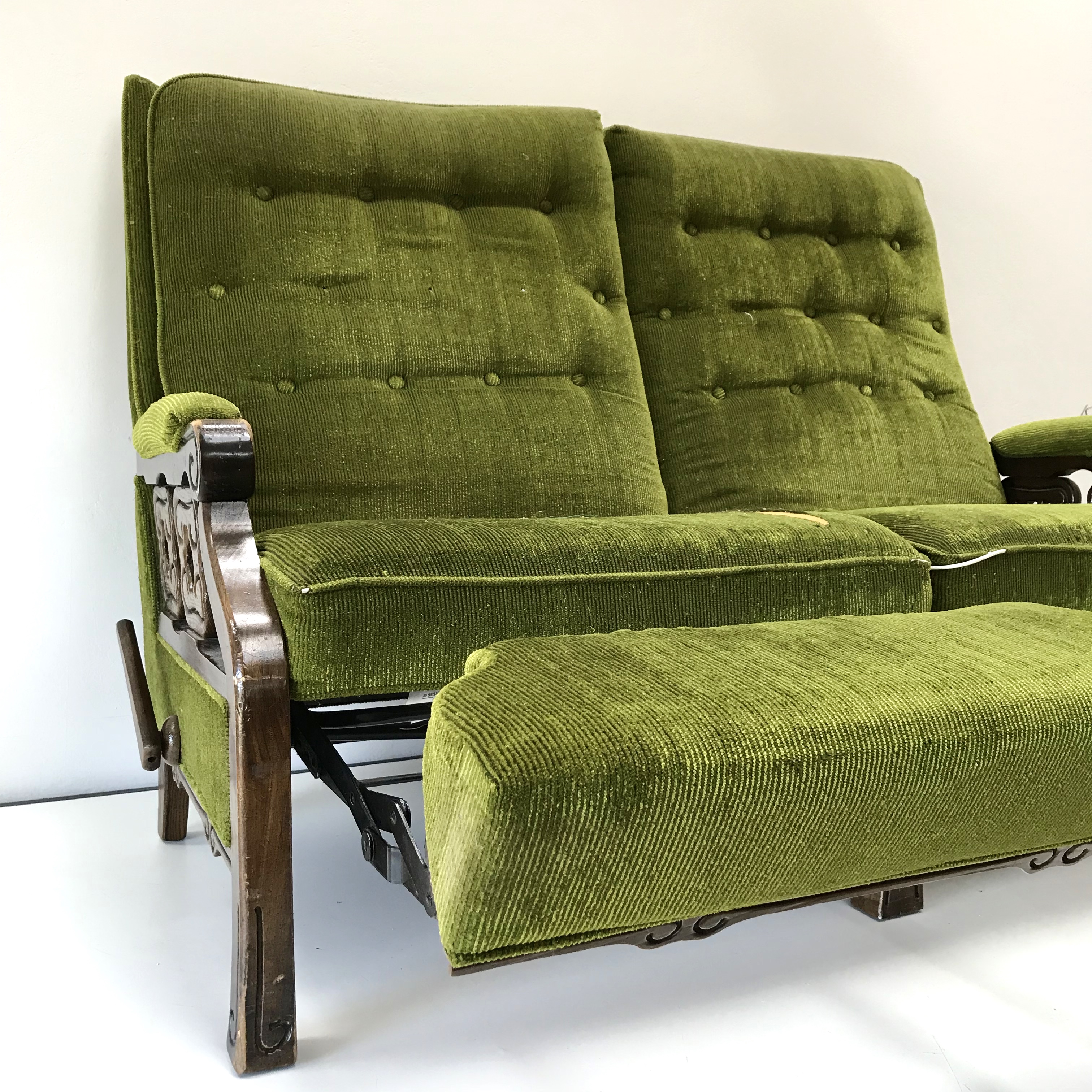 1970's La-Z-Boy love seat recliner showing its age.