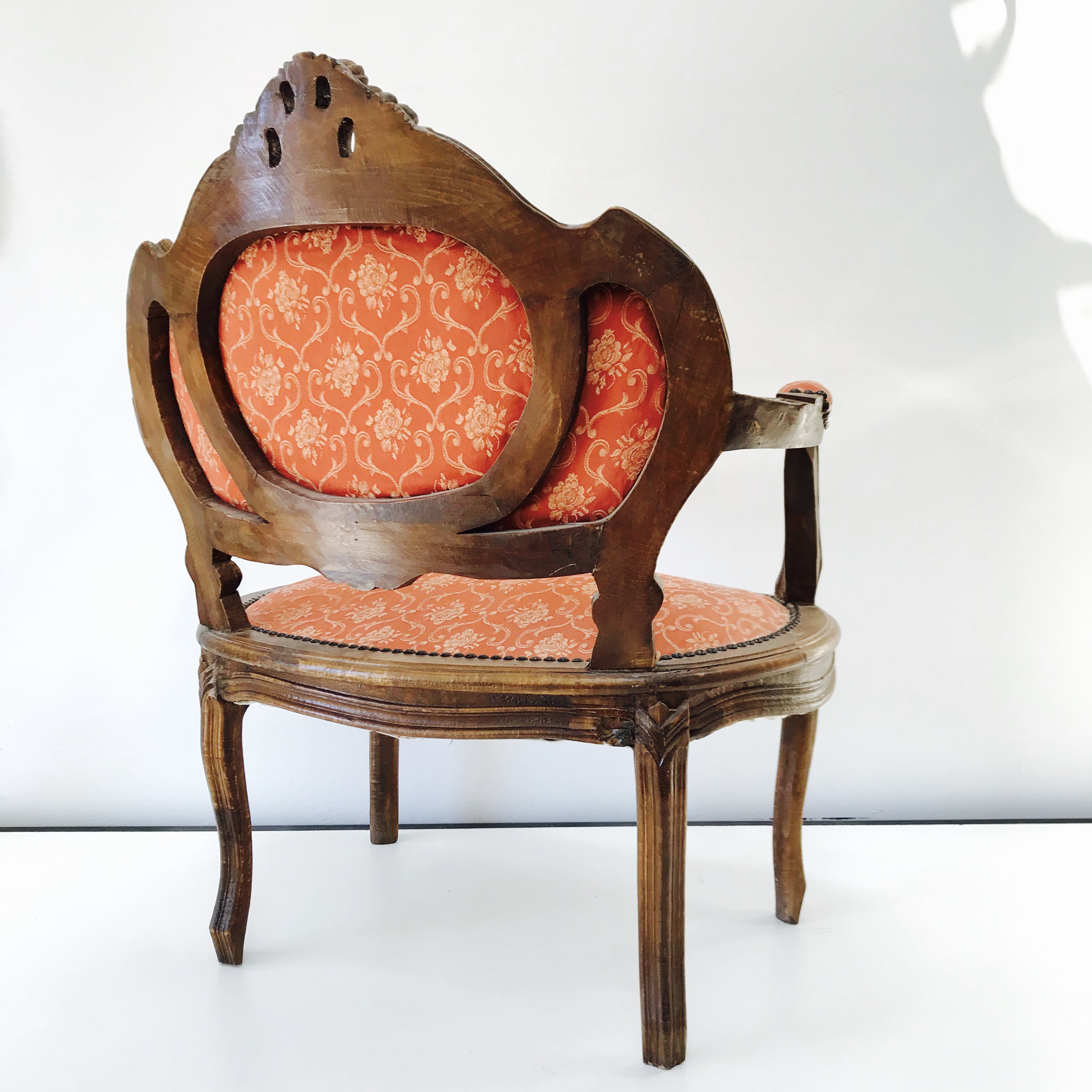 This antique brothel chair was falling apart.