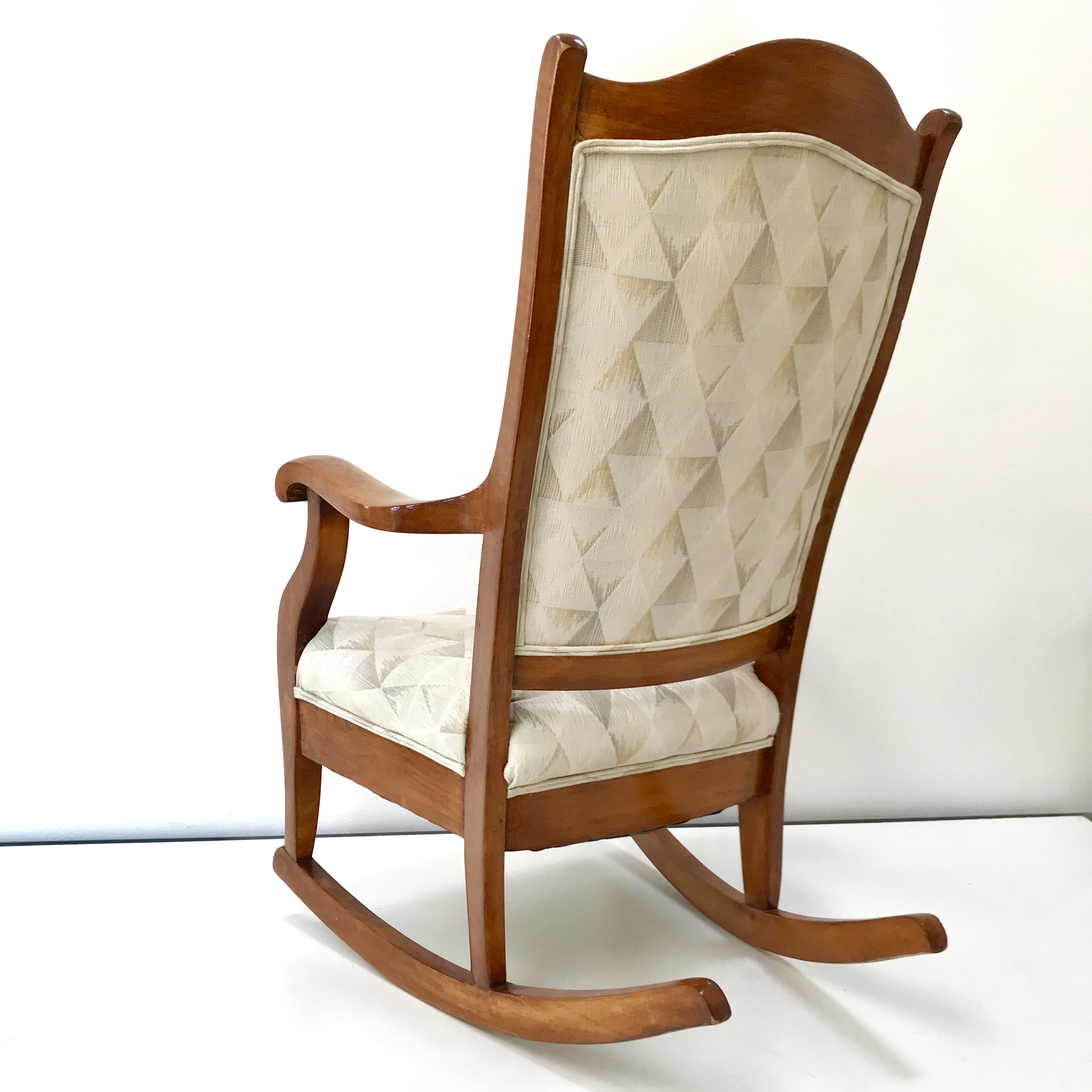 Last reupholstered in the 80s, and needing some TLC.