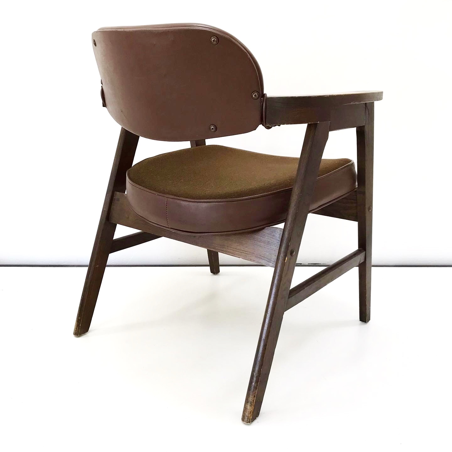 Rickety and dingy vintage desk chair has potential.