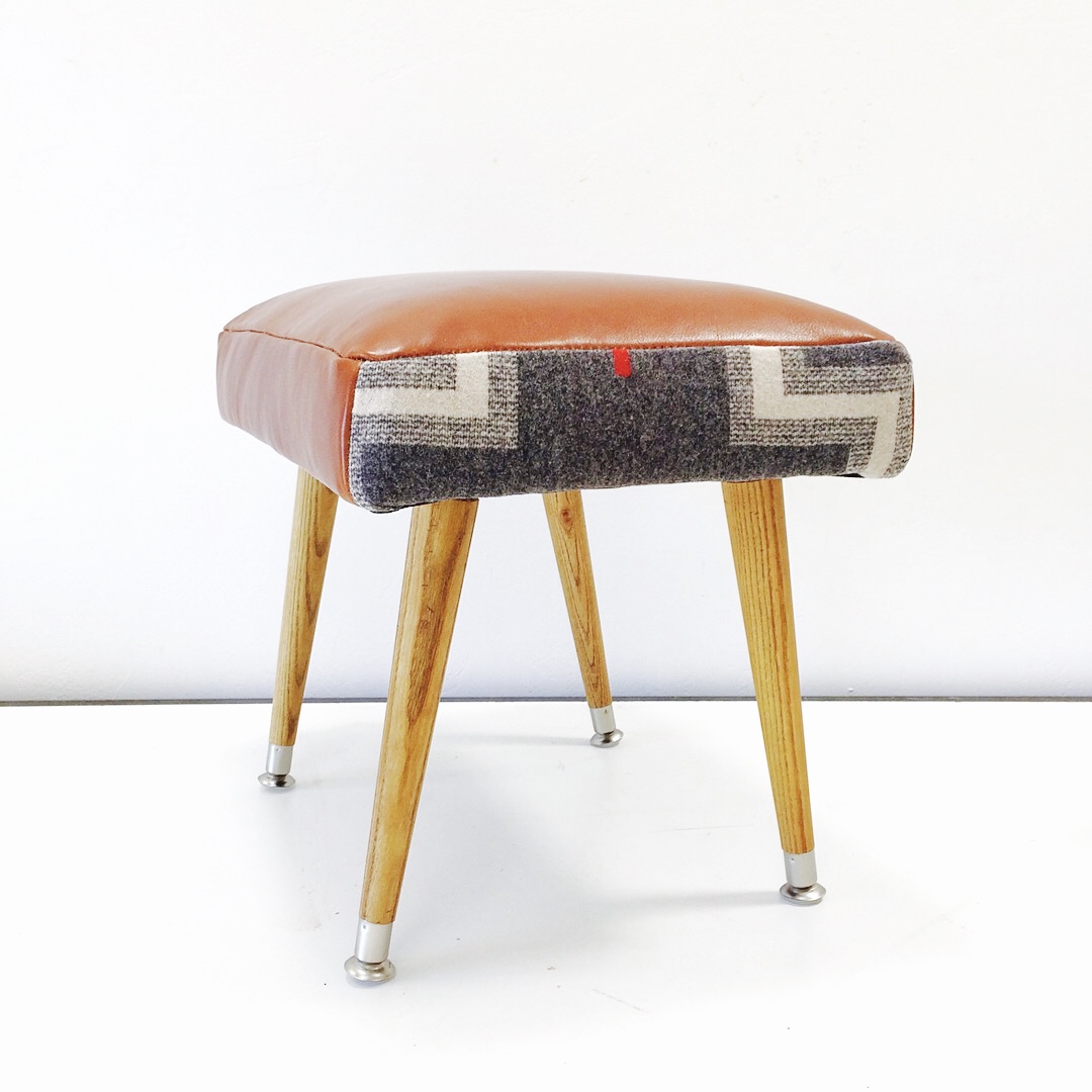 This stool was built from scratch and reupholstered with remnant fabrics.