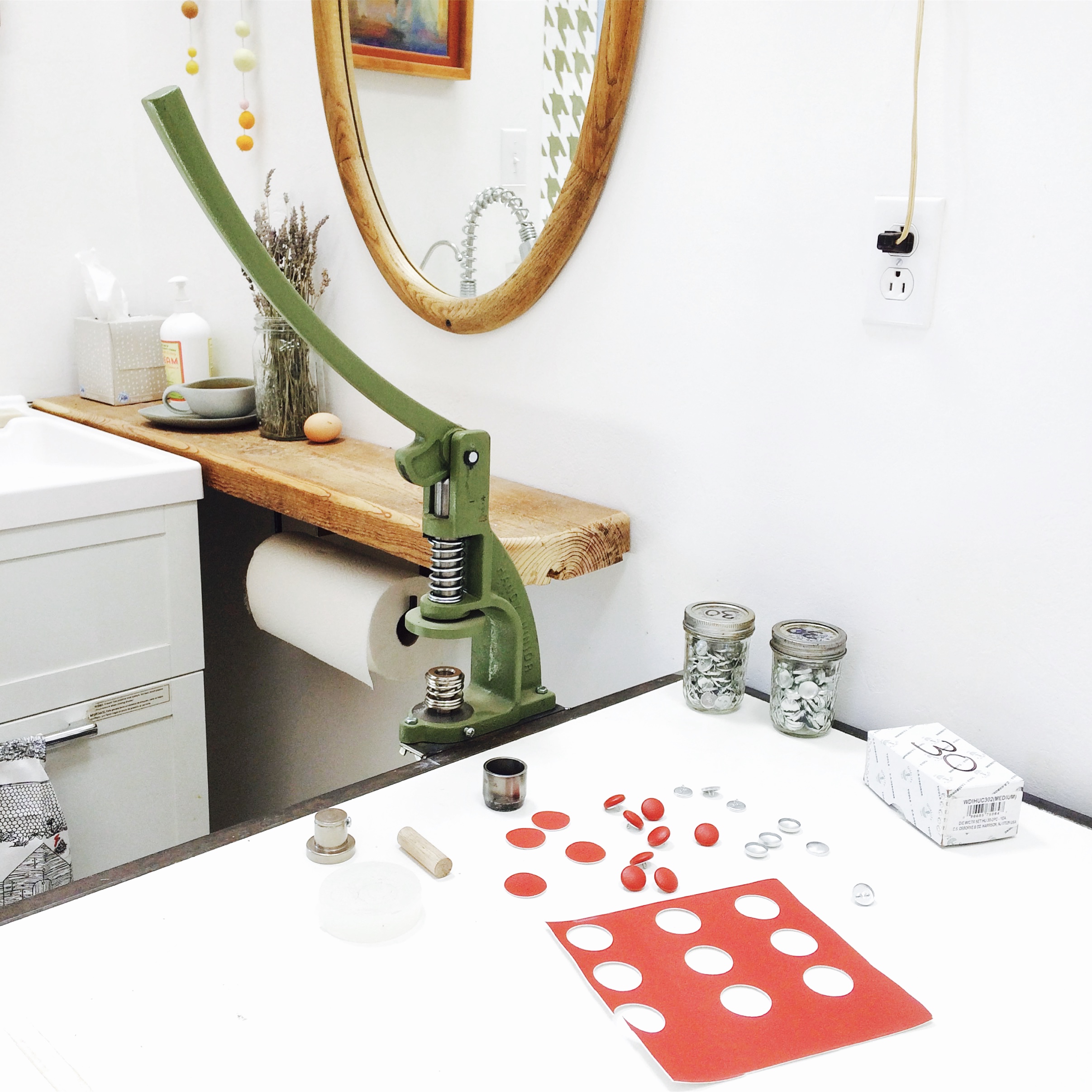 The most fun machine in the studio--the button maker.