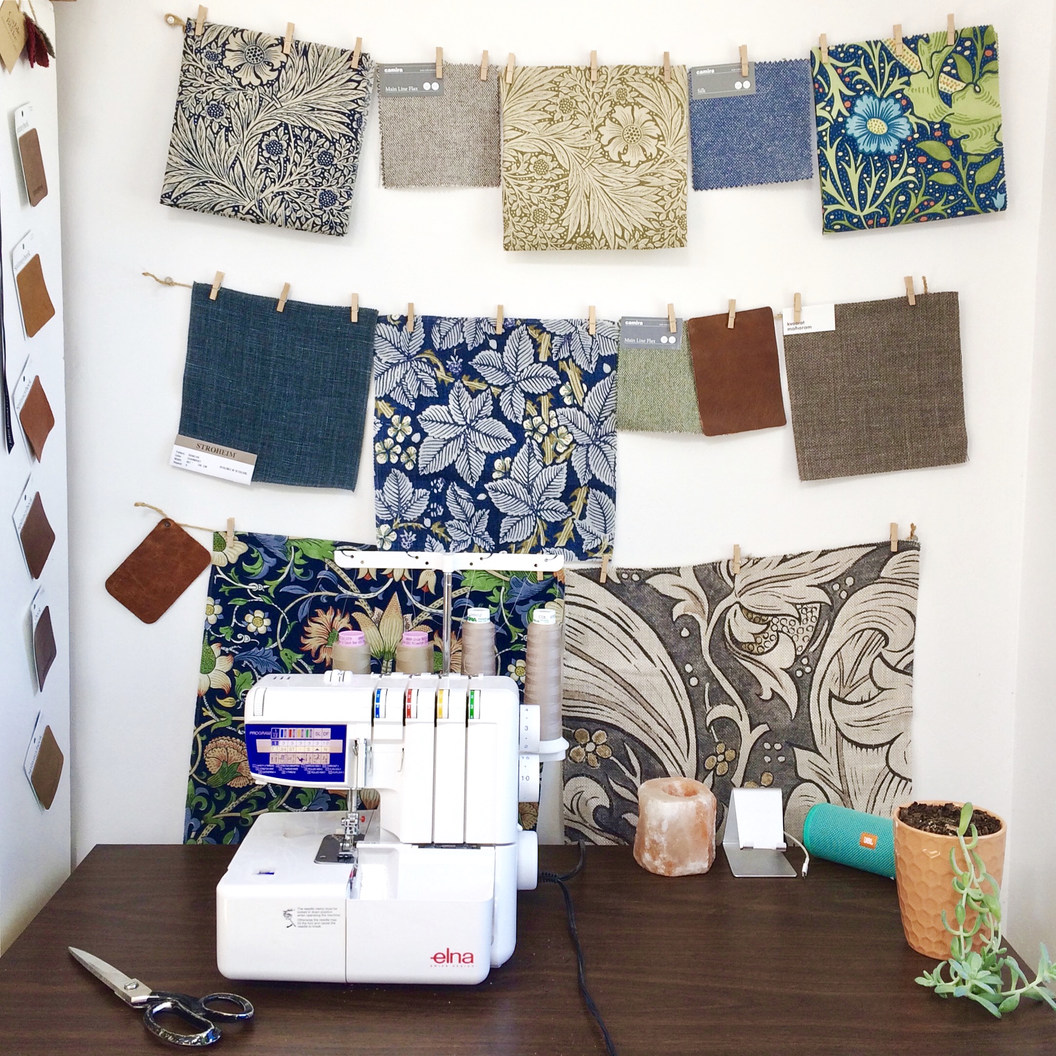 The serger and a display of new samples.