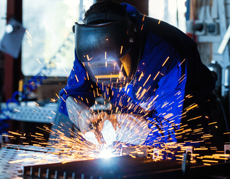 ITI trainees gaining hands-on experience through apprenticeship for ITI students in an industrial setting.