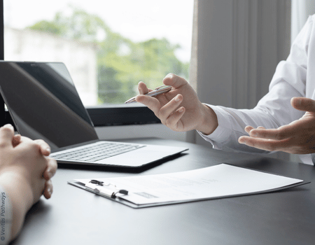 Candidate preparing to answer common interview questions using proven strategies for confidence and clarity.