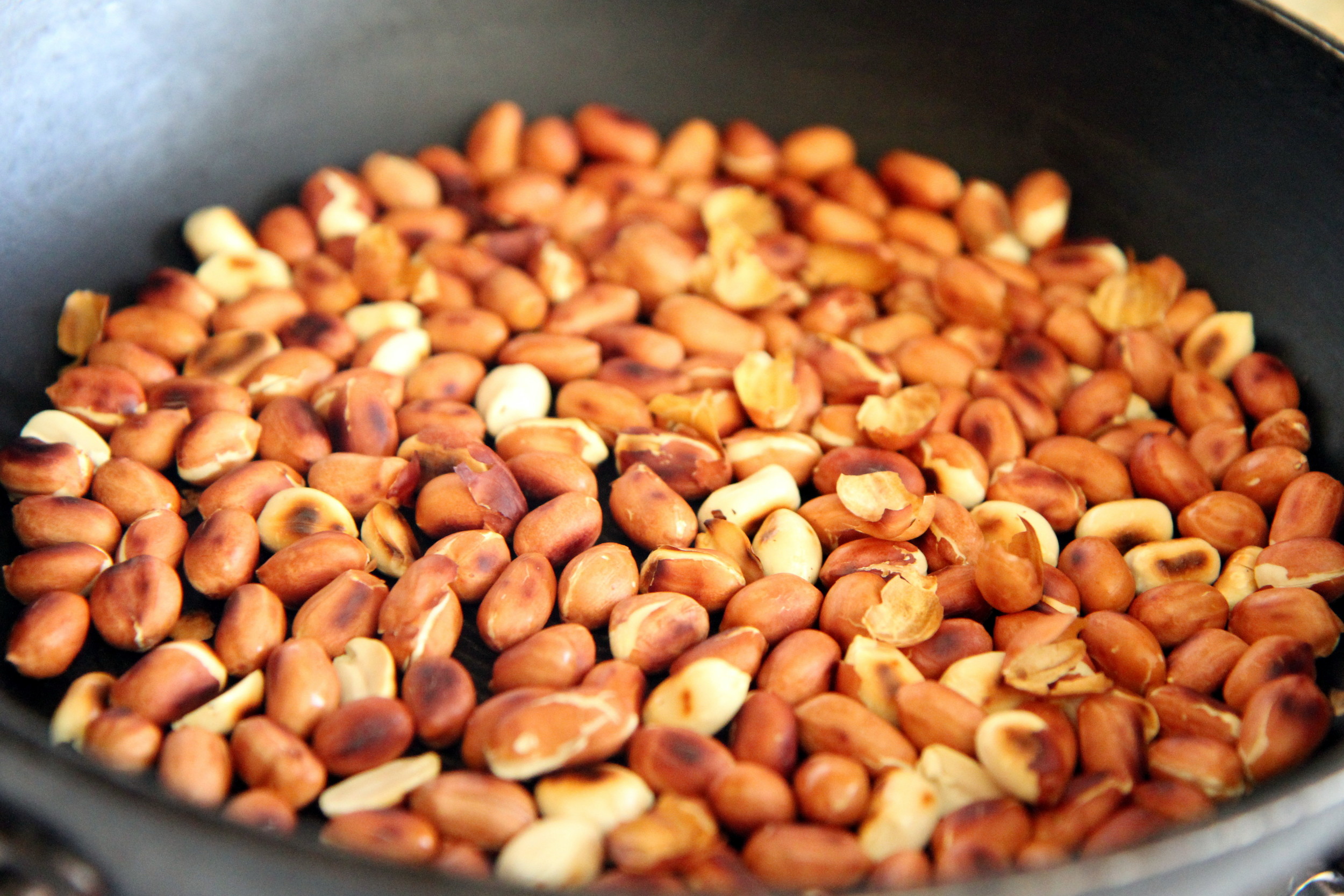 Roasted Peanuts. Remove peel by rubbing the peanuts between your fingers and fanning away the peel. Make sure to do this outside.