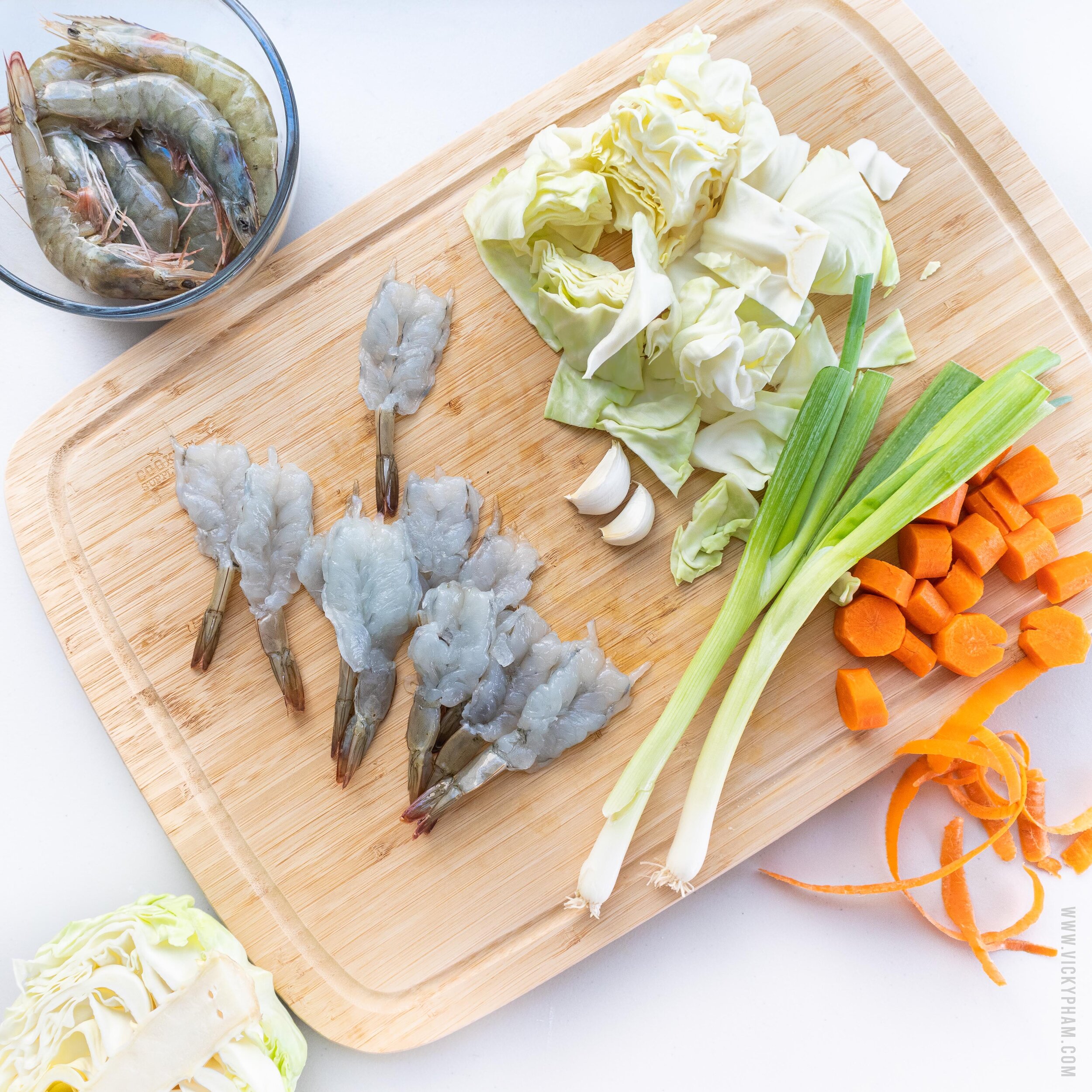 Shrimp, cabbage, garlic, green onions, and carrots