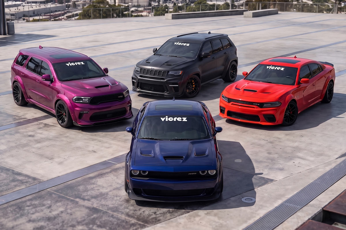 Four Vicrez-equipped vehicles - Durango SRT, Grand Cherokee Trackhawk, widebody Charger, and Challenger Hellcat - parked on a rooftop