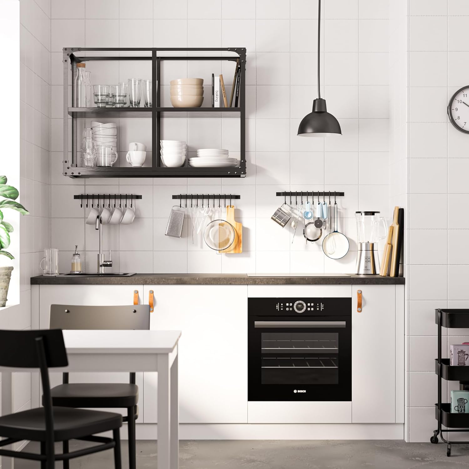 Kitchen rail with hooks holding various utensils