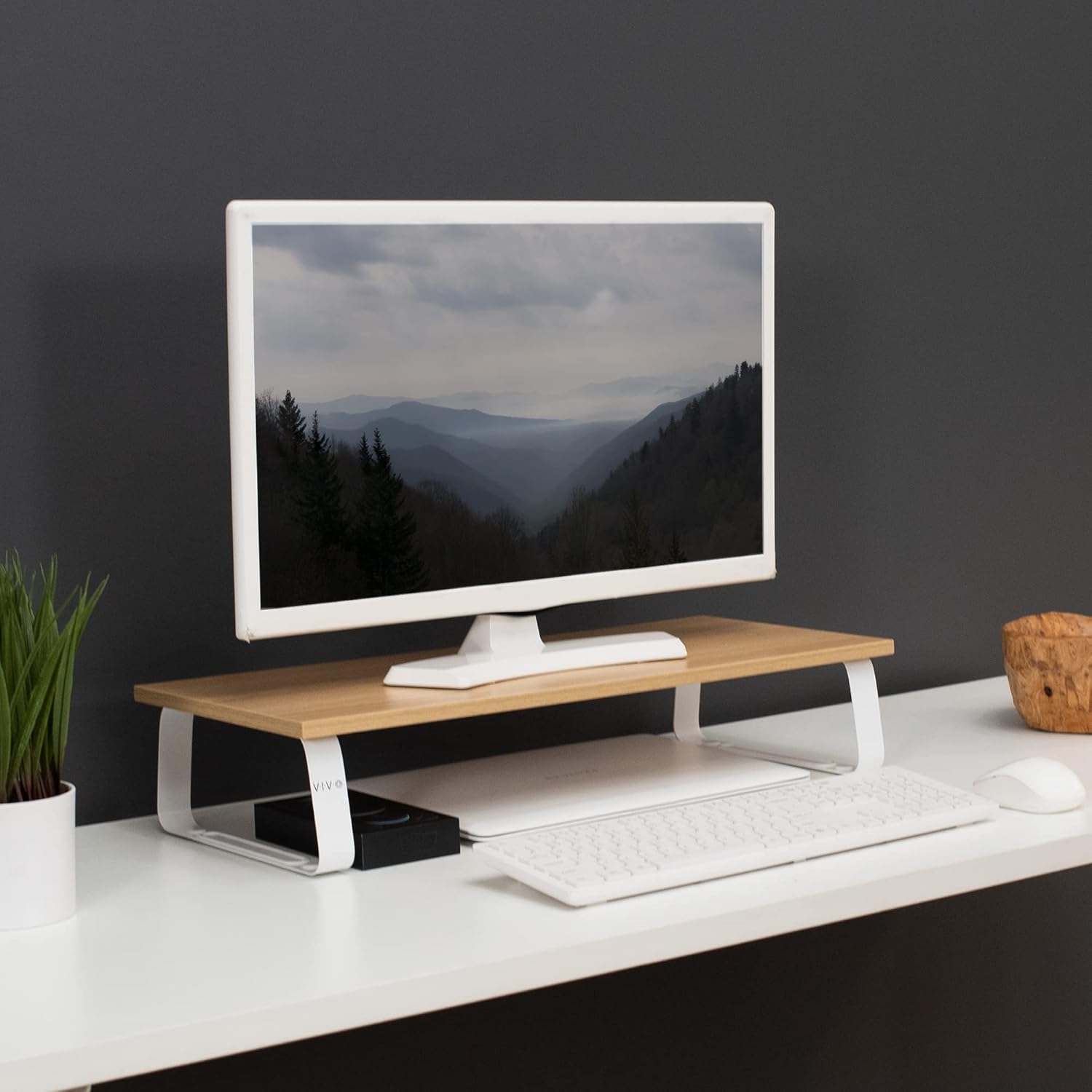 Desktop monitor stand in a modern home office