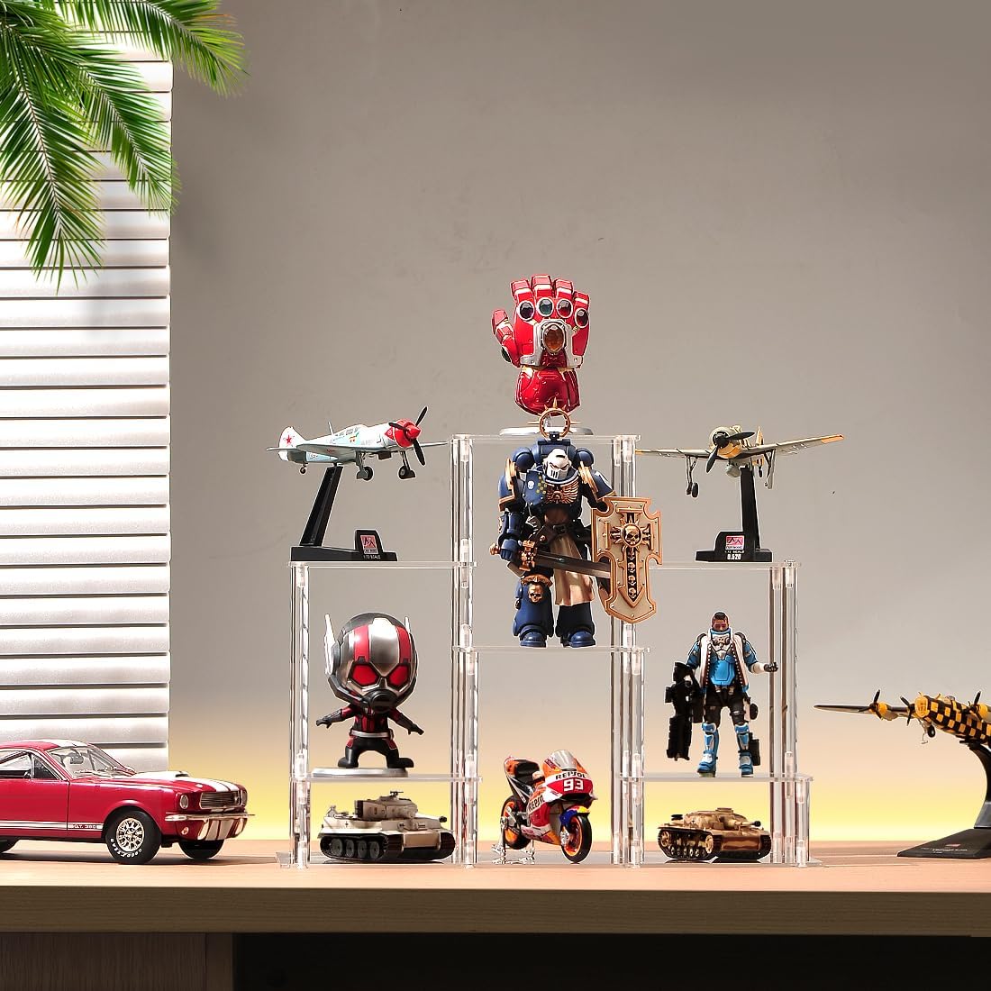 Acrylic display shelf showcasing a collection of figurines