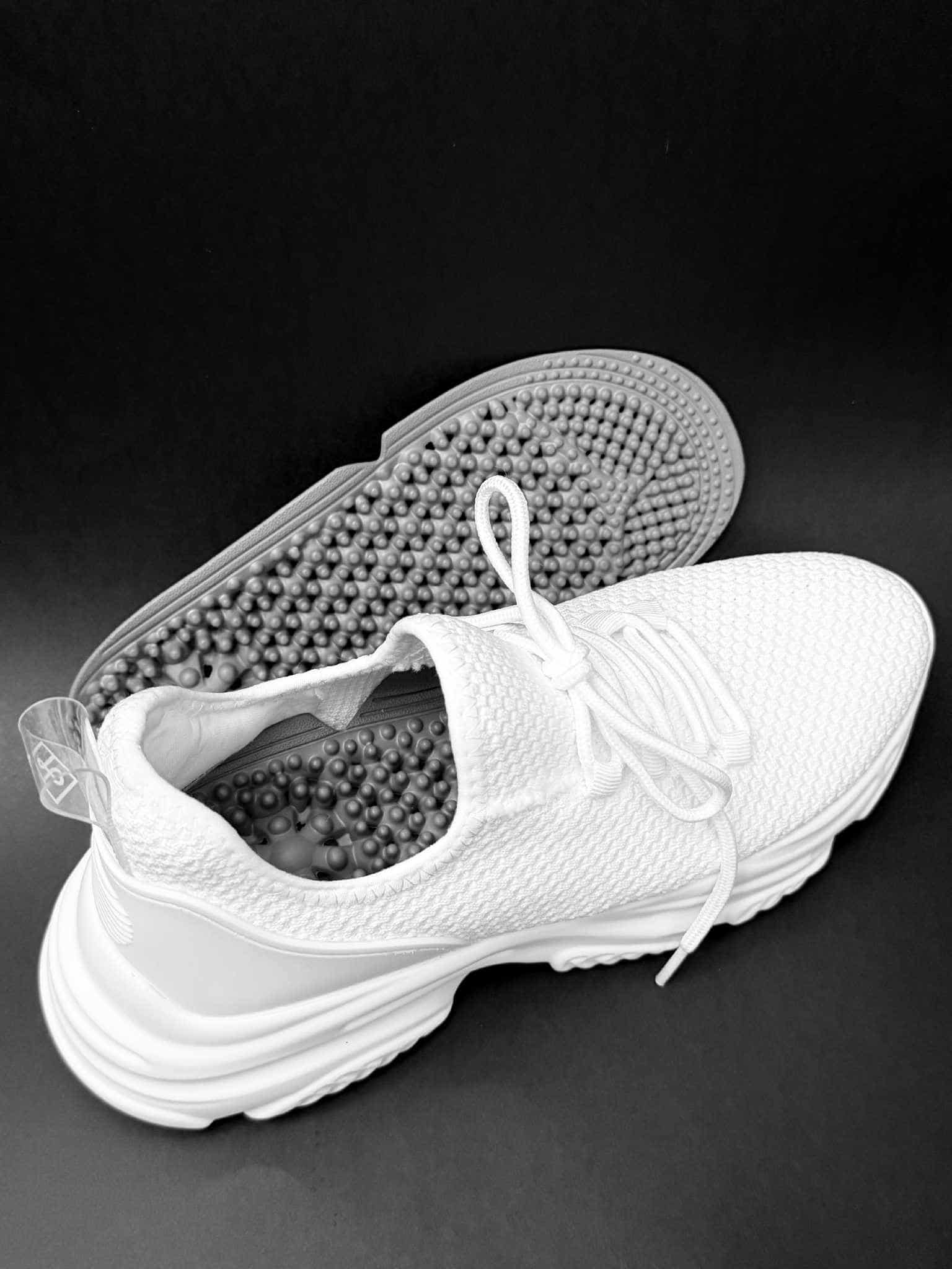 white athletic shoes with SP1KE insole