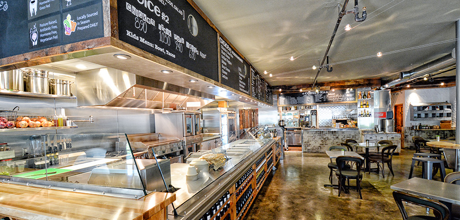 Java Burrito Co serving counter with table seating.