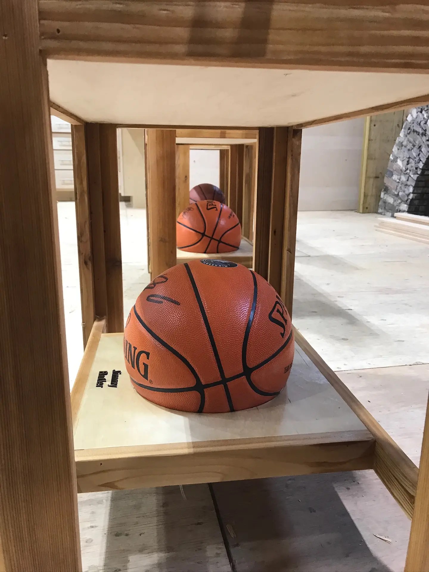 signed basketballs on base of custom timberwolves coolers