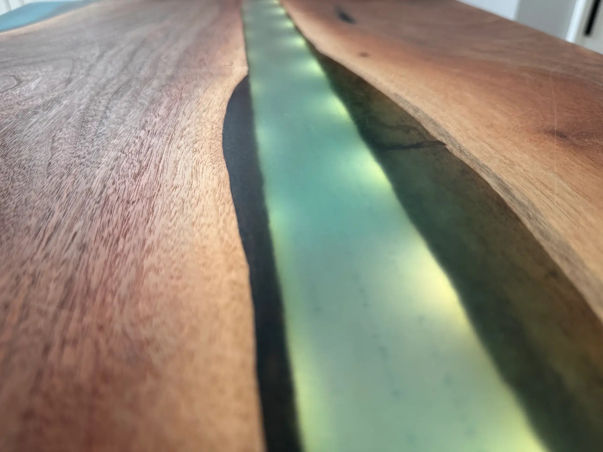 custom lighting on epoxy river table