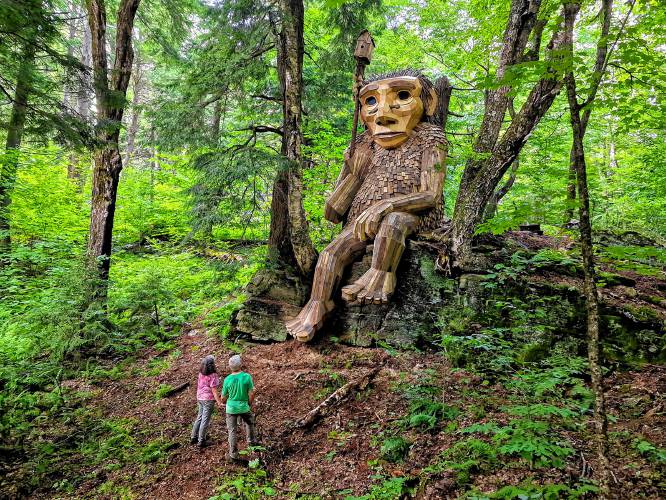 Giant wooden troll that became local Vermont sensation retreats