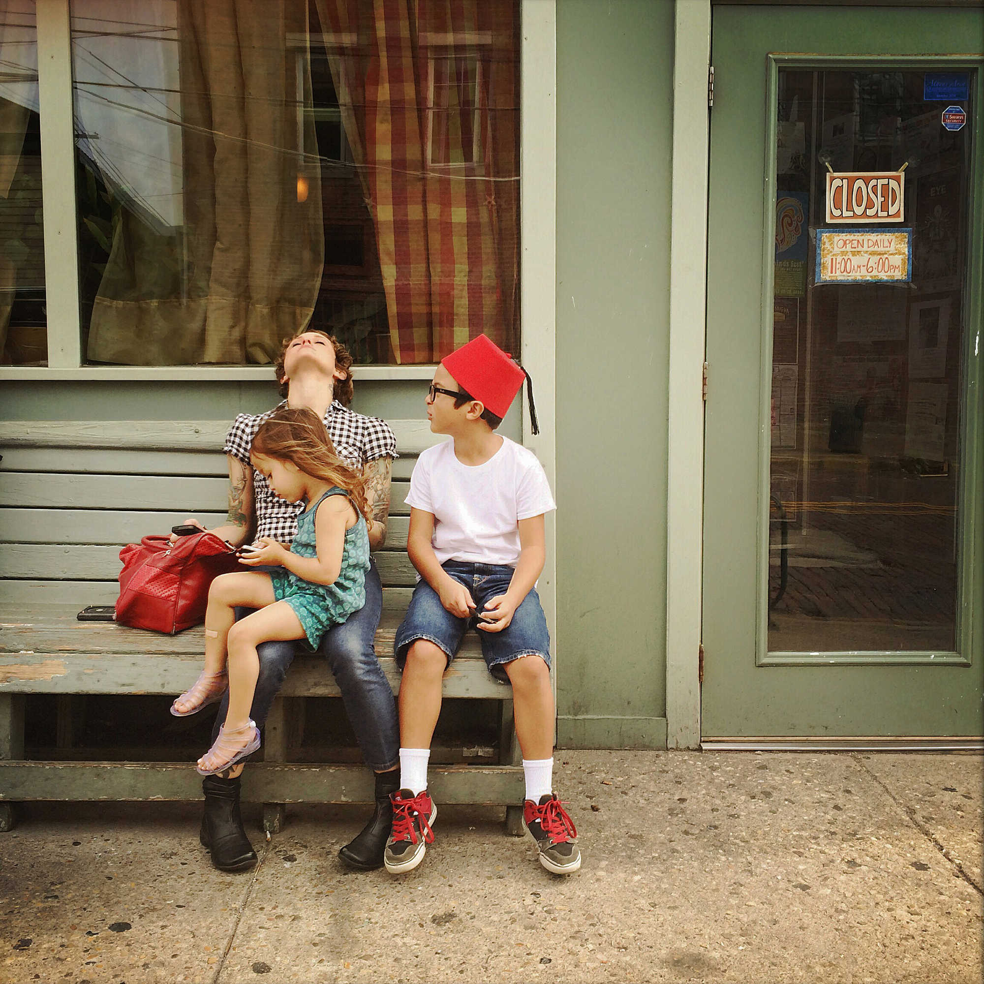 The morning after completing the first leg of the trip my wife Jasmine Facun, our daughter Opal and Levi-Joseph, 9, wait to be seated at a cafe in Athens, Ohio. We stopped in Athens to give my son a tour of Ohio University where I attended school.