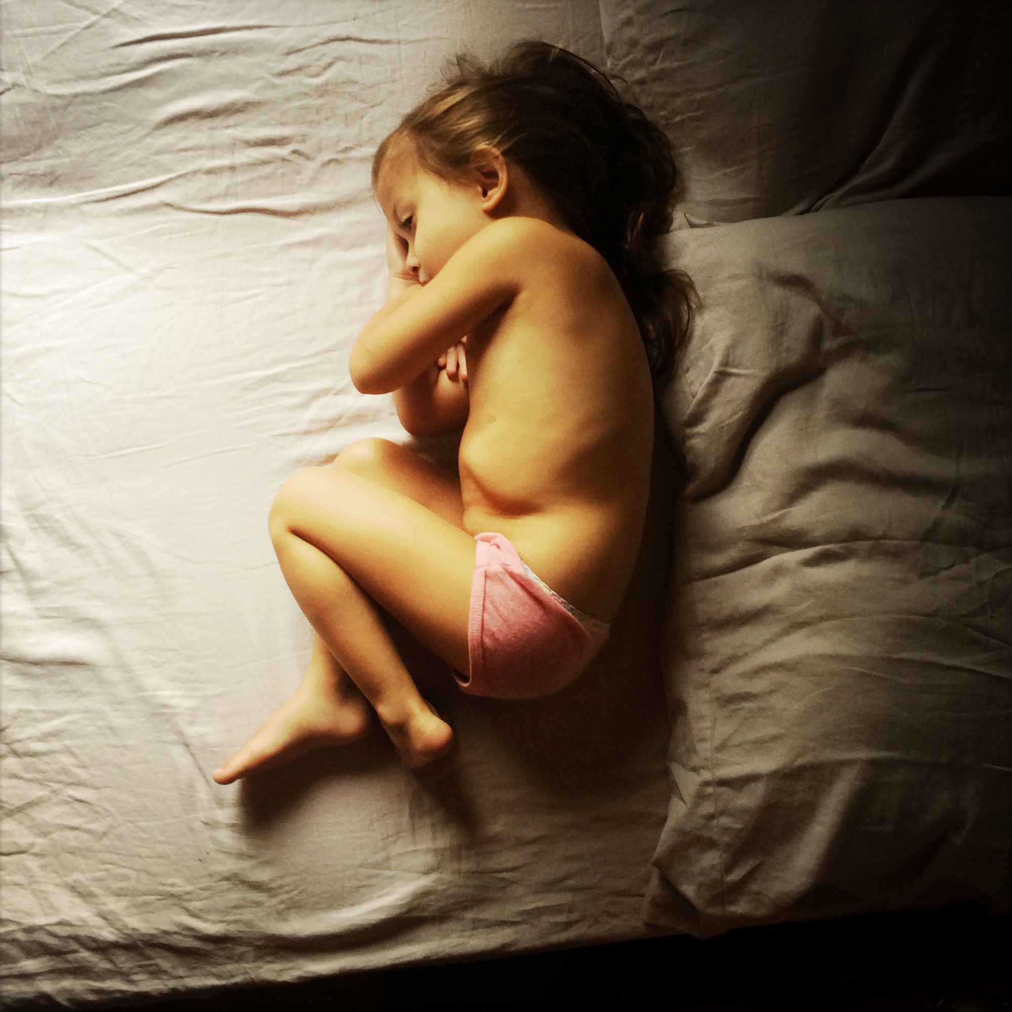 Road trips don't always go as planned. While en route to a relatives ranch in Colorado we discovered that due to a miscommunication we weren't going to be able to stay at their home. We made a quick adjustment and ended up visiting a friend in Denver, CO where our daughter Opal, 3, curled up in the warmth of the morning sun.