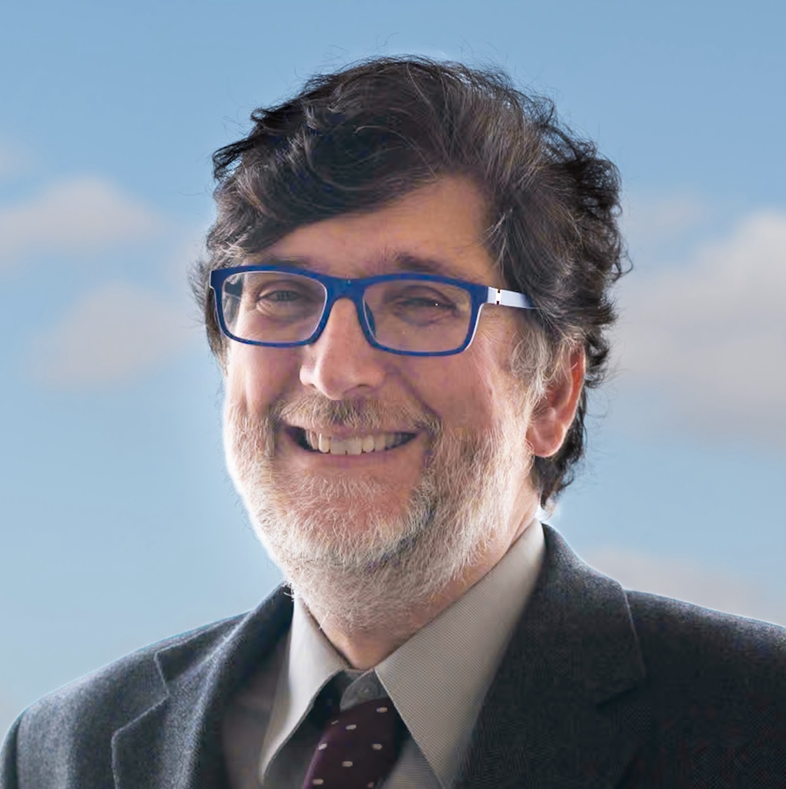 Picture of Steve Volan, with blue-framed glasses
