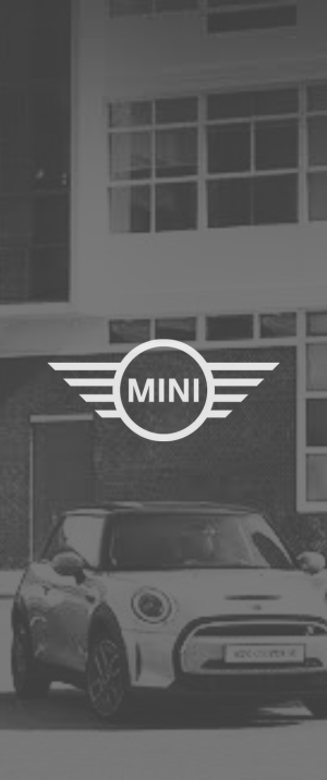 mini cooper parked in front of building