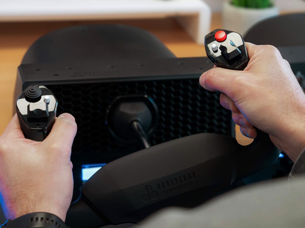 Honeycomb Alpha Flight Controls Lite from the rear in use joystick and yoke visible
