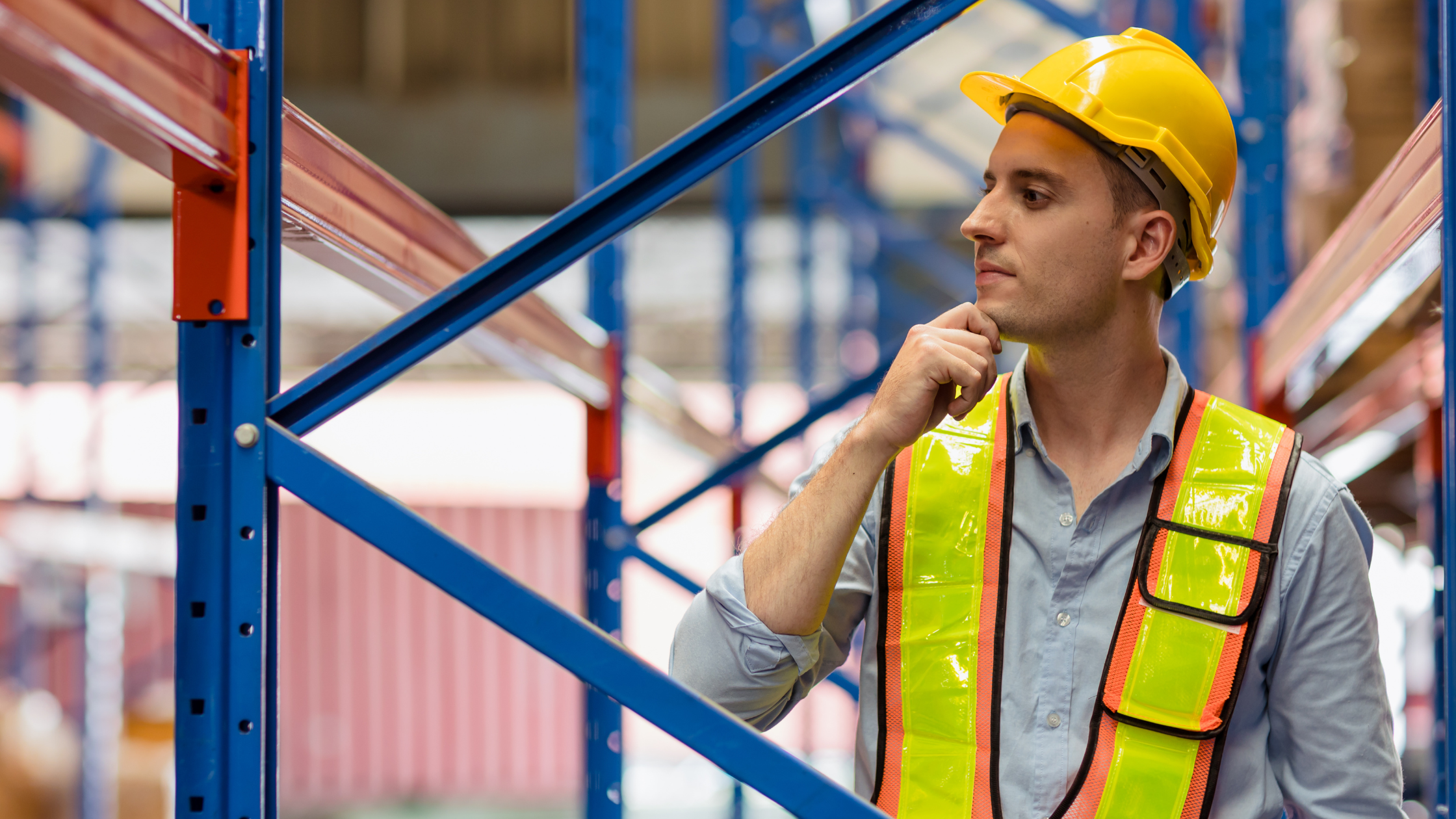 Construction worker inspecting equipment.