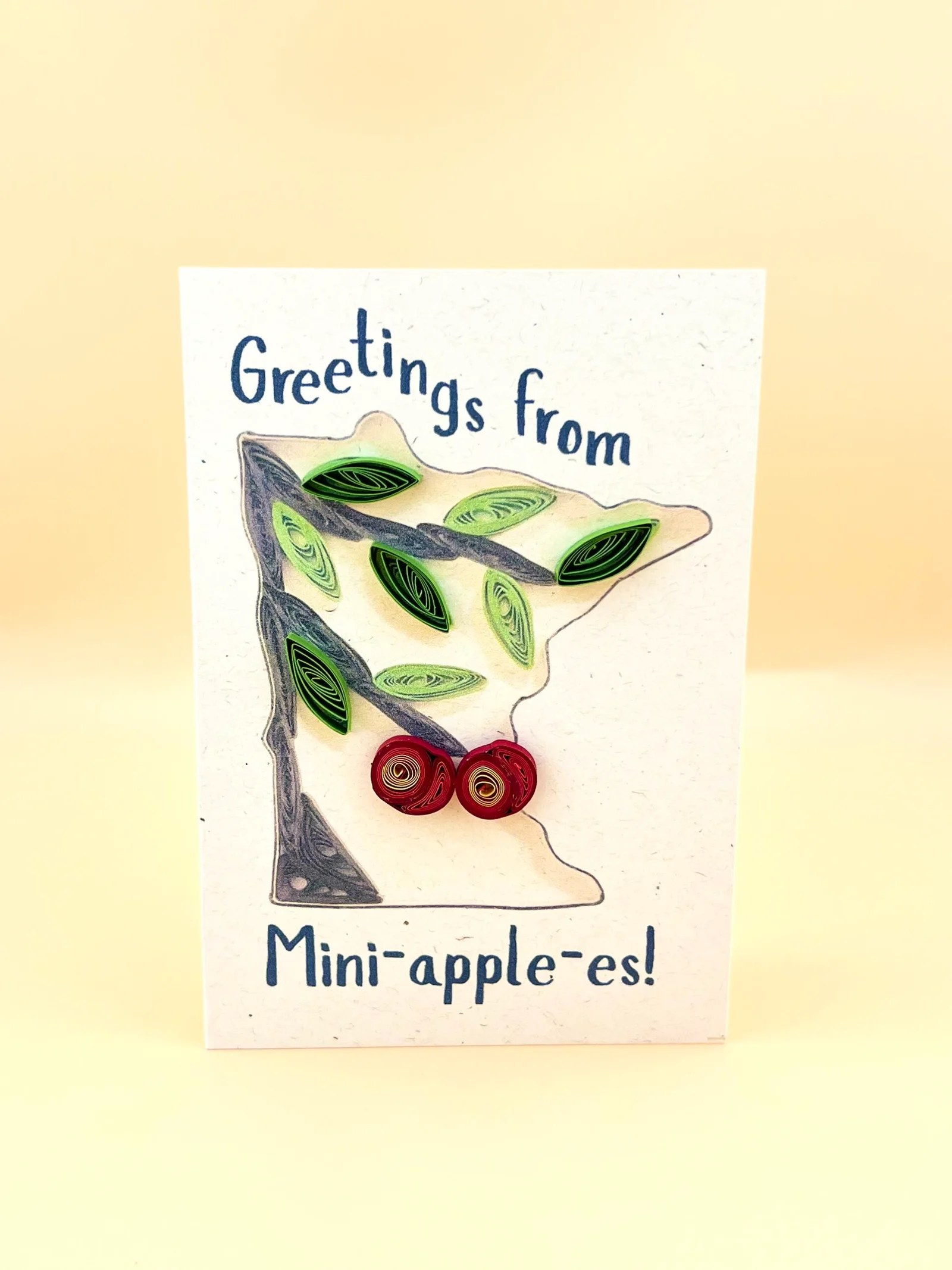 "Greetings from Mini-apple-es" card