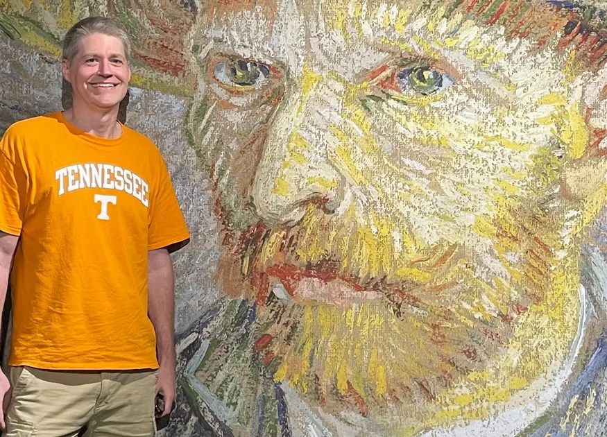 Artist Ken Wagstaff at the Van Gogh Experience exhibit.