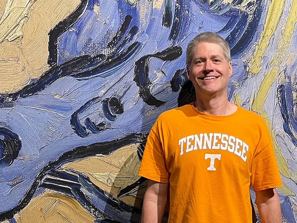 Artist Ken Wagstaff at the Van Gogh Experience exhibit.