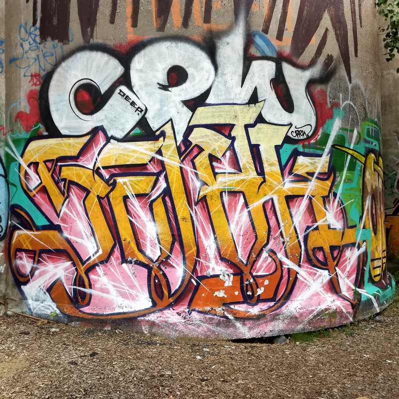 Serak at ground level and Deep on the throw above, on an abandoned building