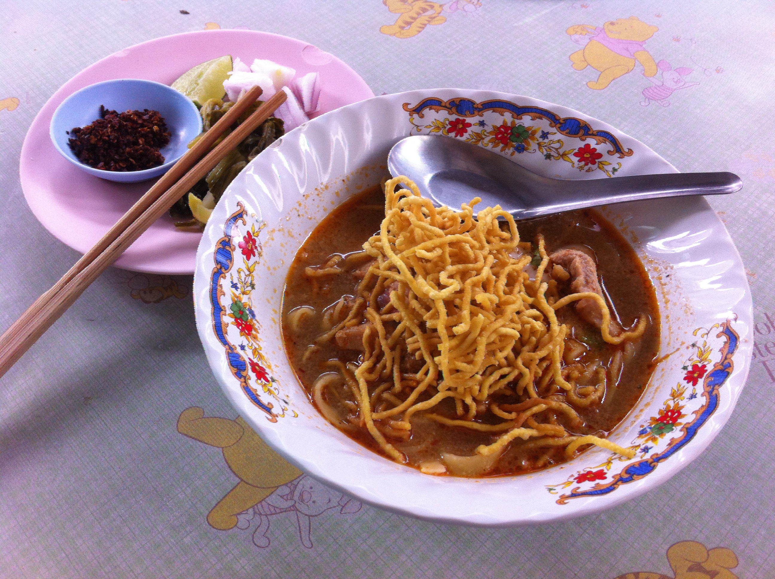 Khao Soi with chilli, lime, shallots and pickled mustard greens