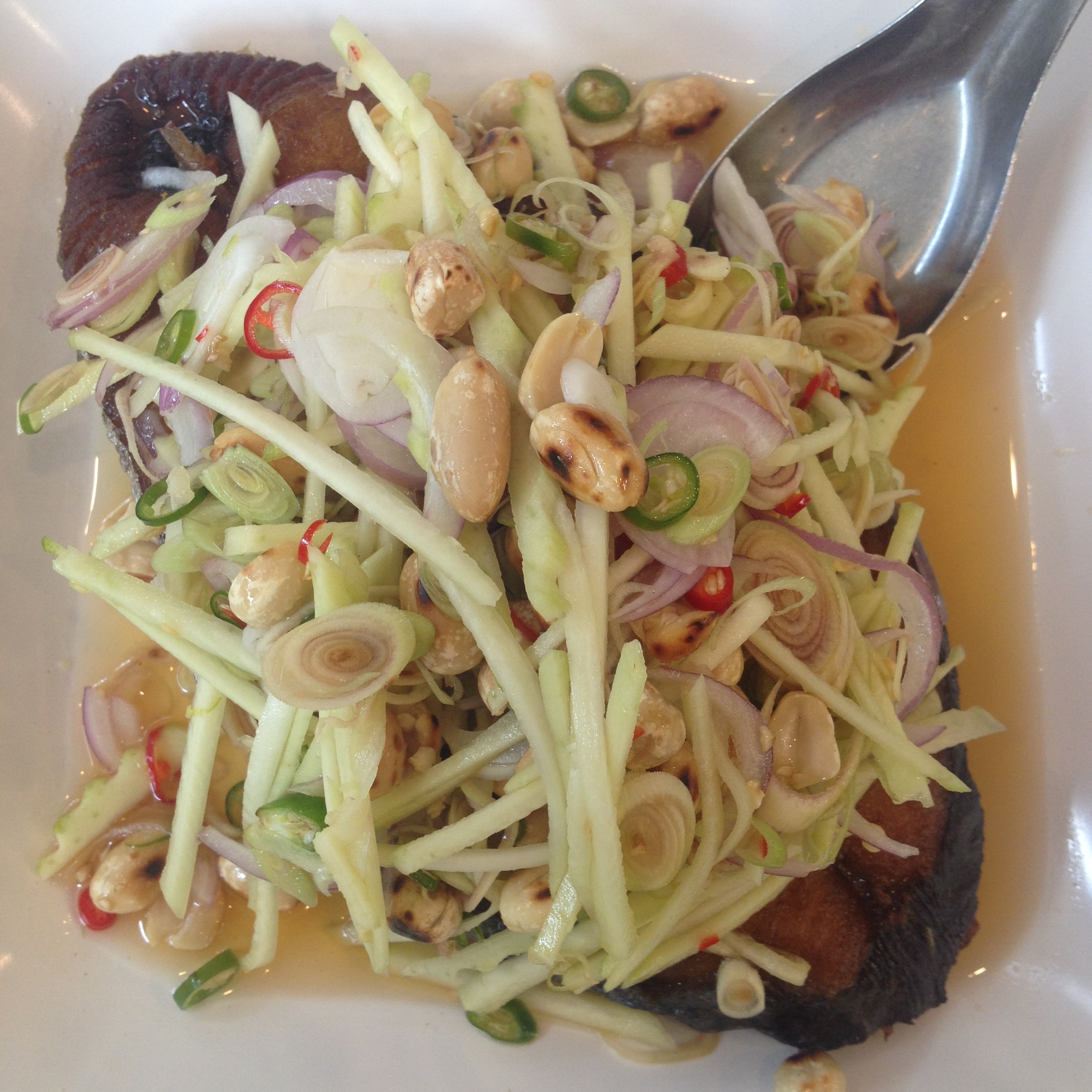Snakehead fish with green mango salad