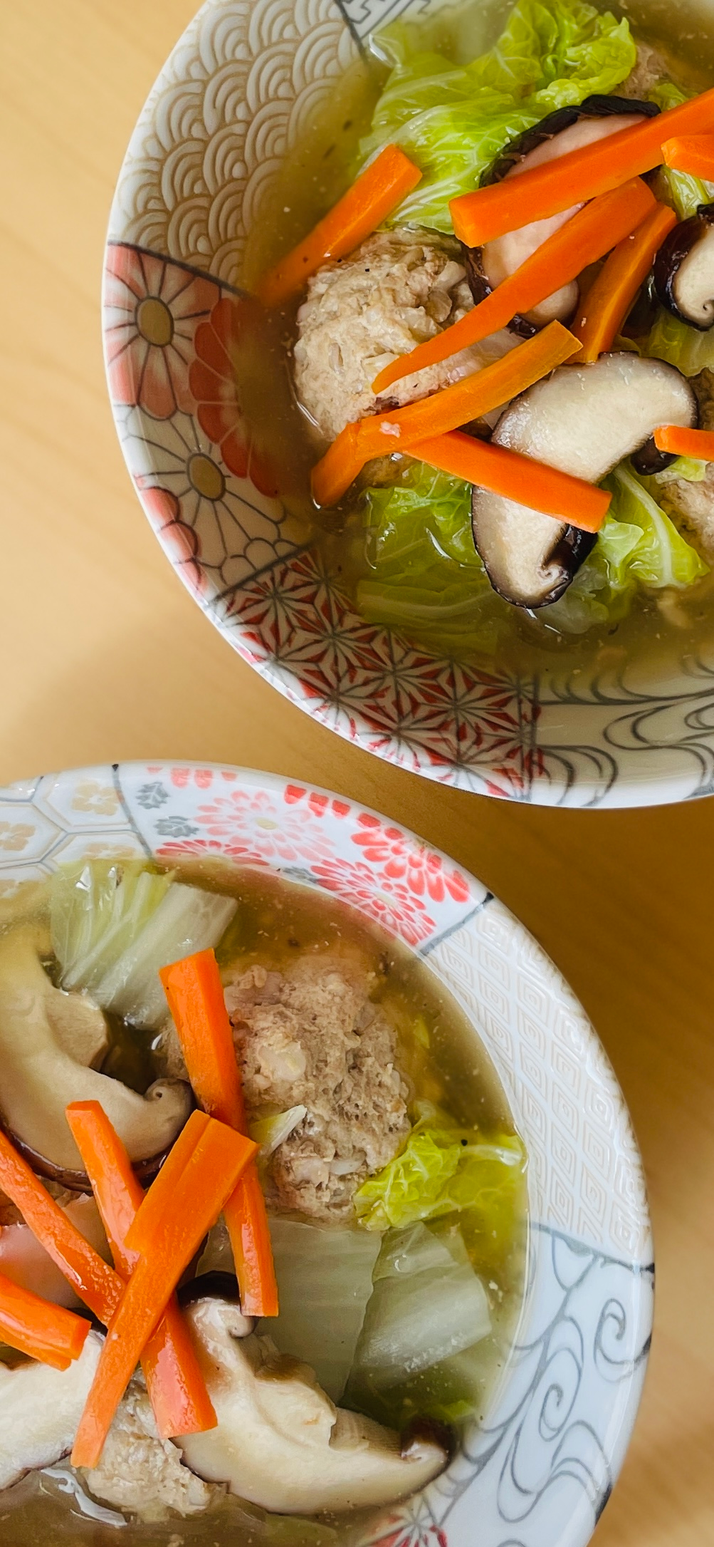 Healthy soup with chicken and oatmeal meatballs, vegetables, and clear broth