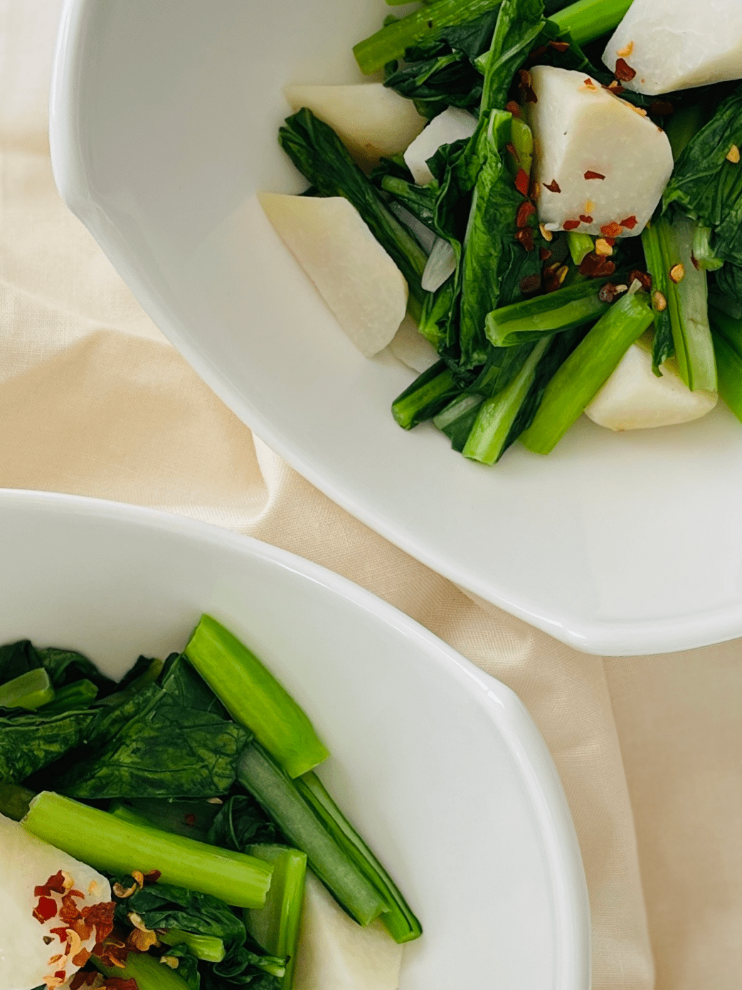 Easy Japanese vegetable side dish – garlic stir-fried komatsuna greens and microwaved taro with salt and pepper, quick healthy recipe.