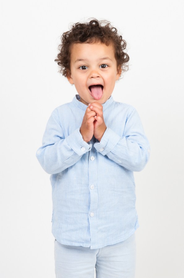 Warm Glow Photo EW56 Studio portrait of young boy in blue shirt. Photographed by Anna Hindocha/Warm Glow Photo