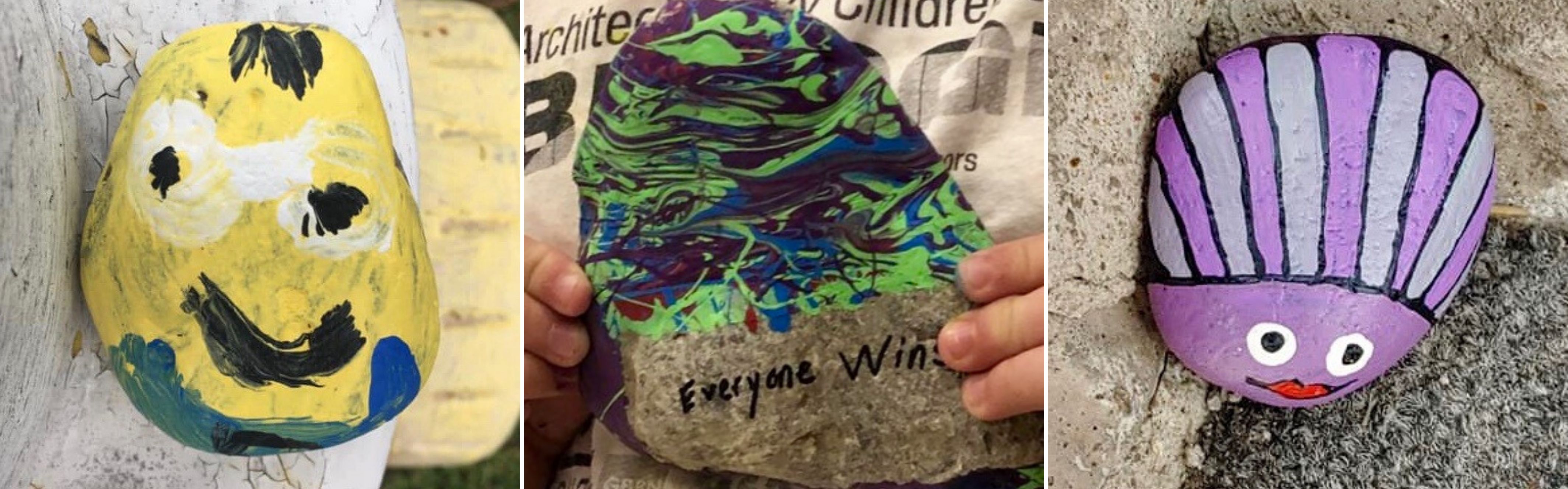 three rocks painted - one smile face, one says everybody wins, one eyes and color