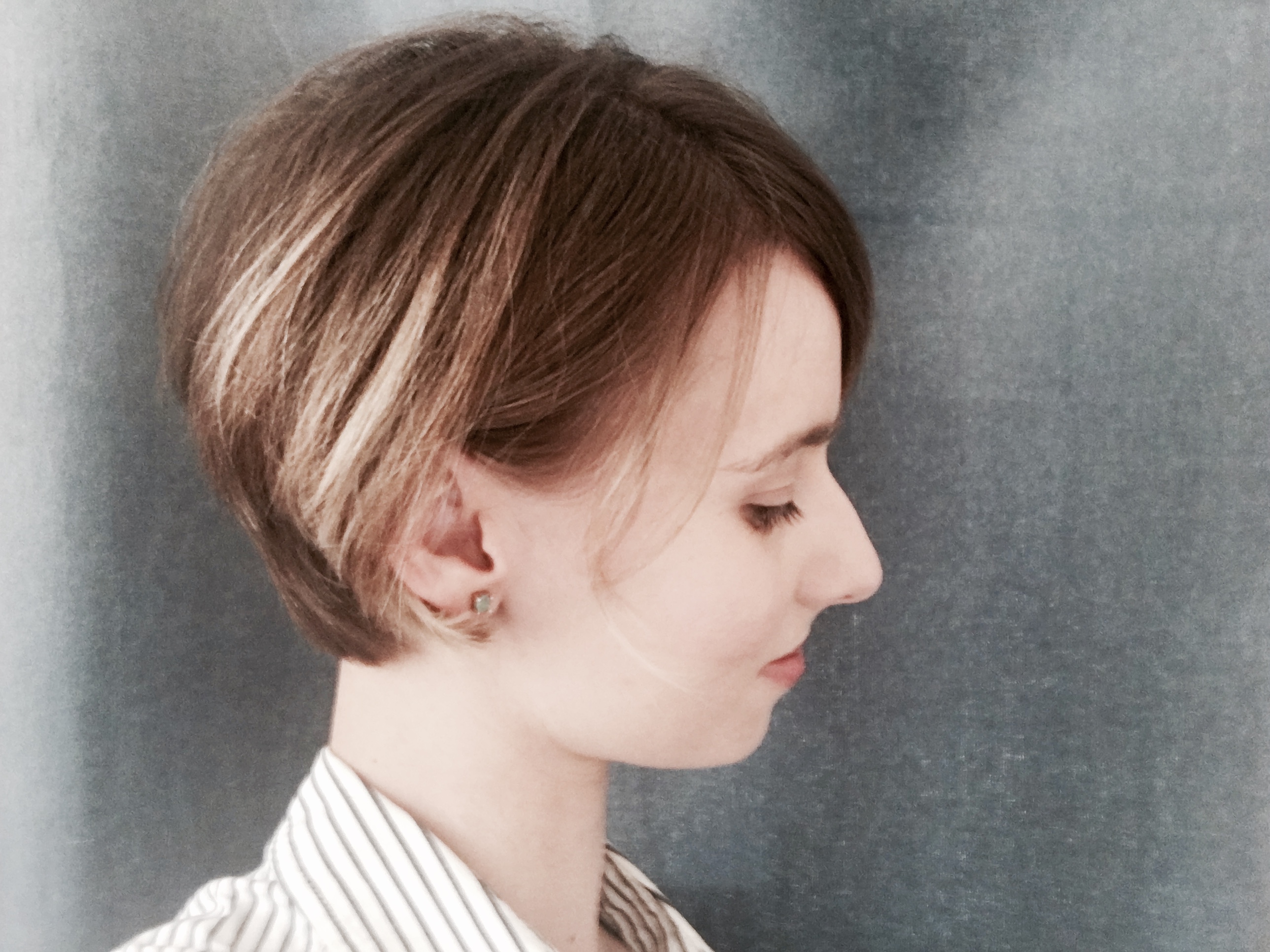 Woman with short pixie cut style bob.