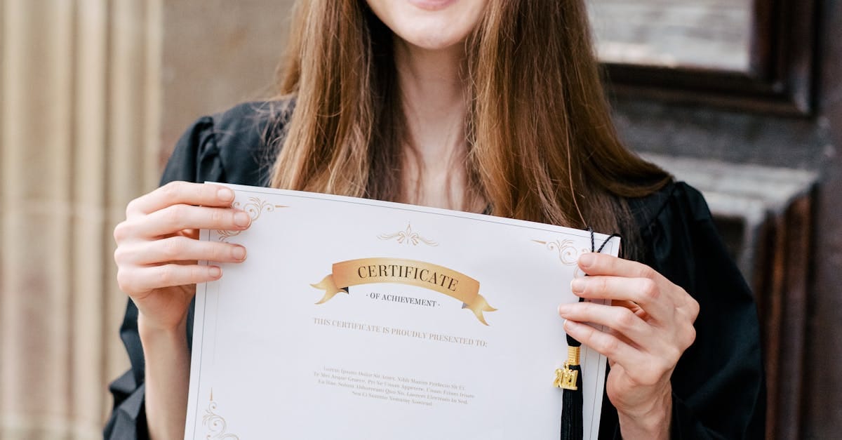 A person holding a graduation cap and certificate, symbolizing student loan cancellation relief.