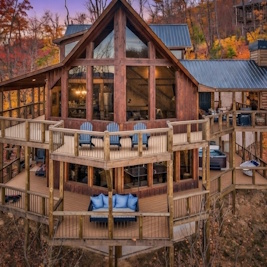 Prow front cabin surrounded by fall foliage